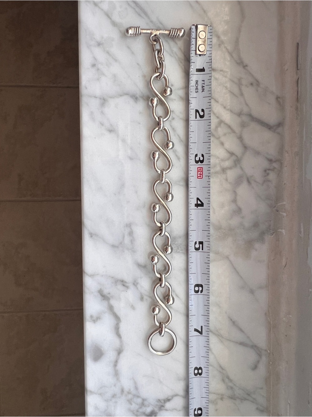 Silver 7.5 inch S-Shaped Solid Toggle Bracelet with Polished Ball Accents - Picture 6 of 11